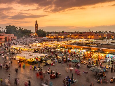 Jamaa el Fna medina quarter marketplace during dusk in Marrakesh, Morocco